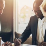 business executives creating a continuity plan