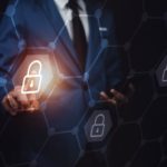 businessman unlocks screen with lock