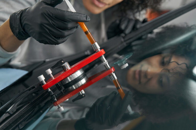 Auto glass mechanic does mobile windshield repair